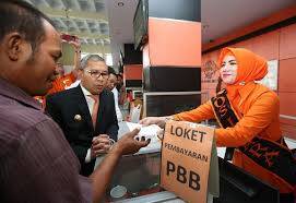 Masyarakat Muarojambi Bayar PBB Lewat Pos