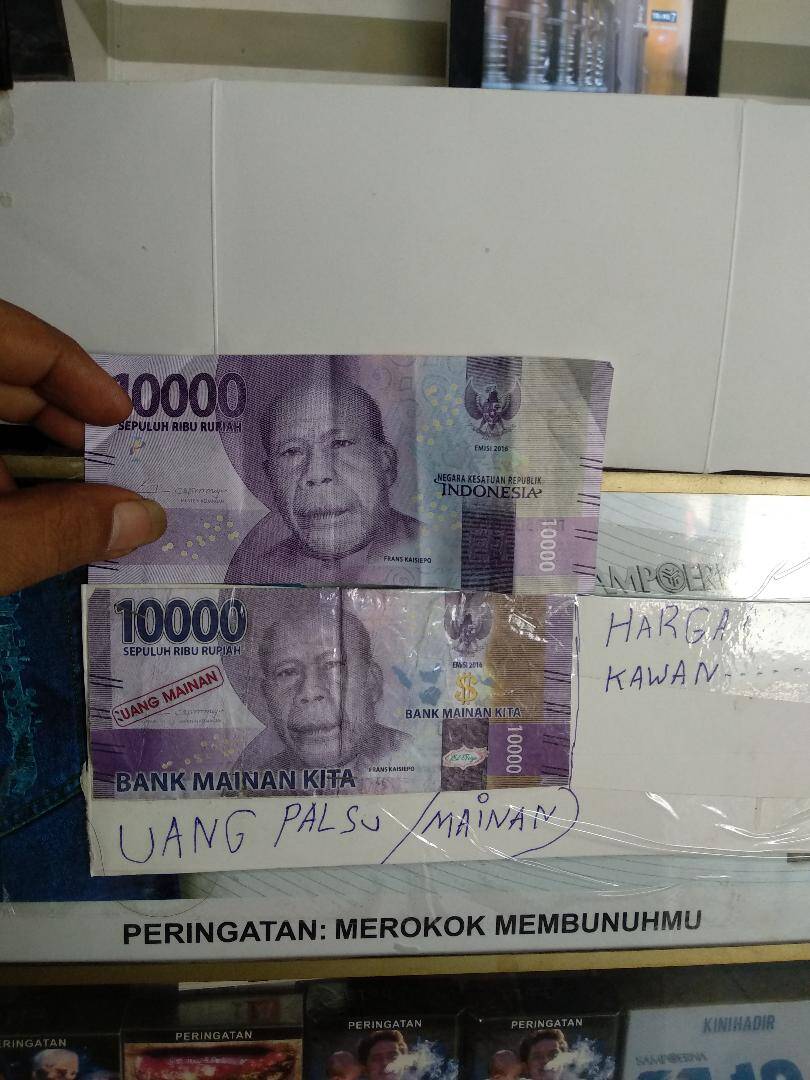 Pedagang Terkecoh Uang Mainan Pecahan Rp 10 Ribu