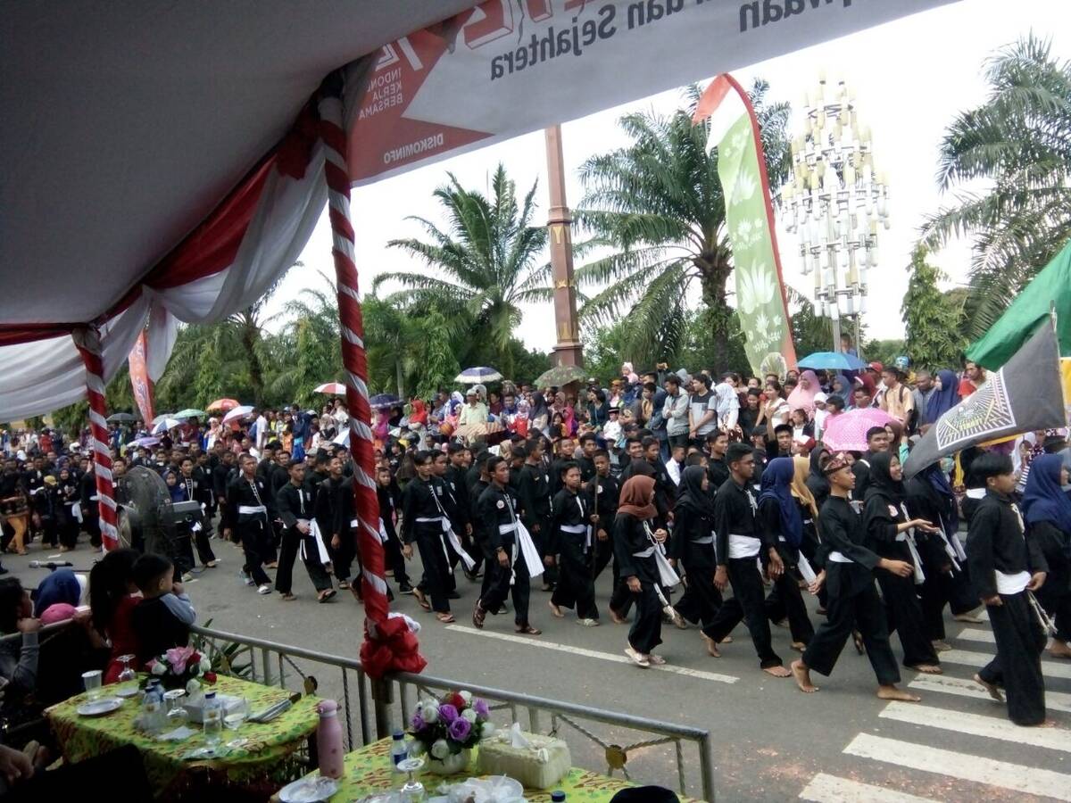 Ratusan Pesilat PSHT Cabang Batanghari Hitamkan Arena Karnaval